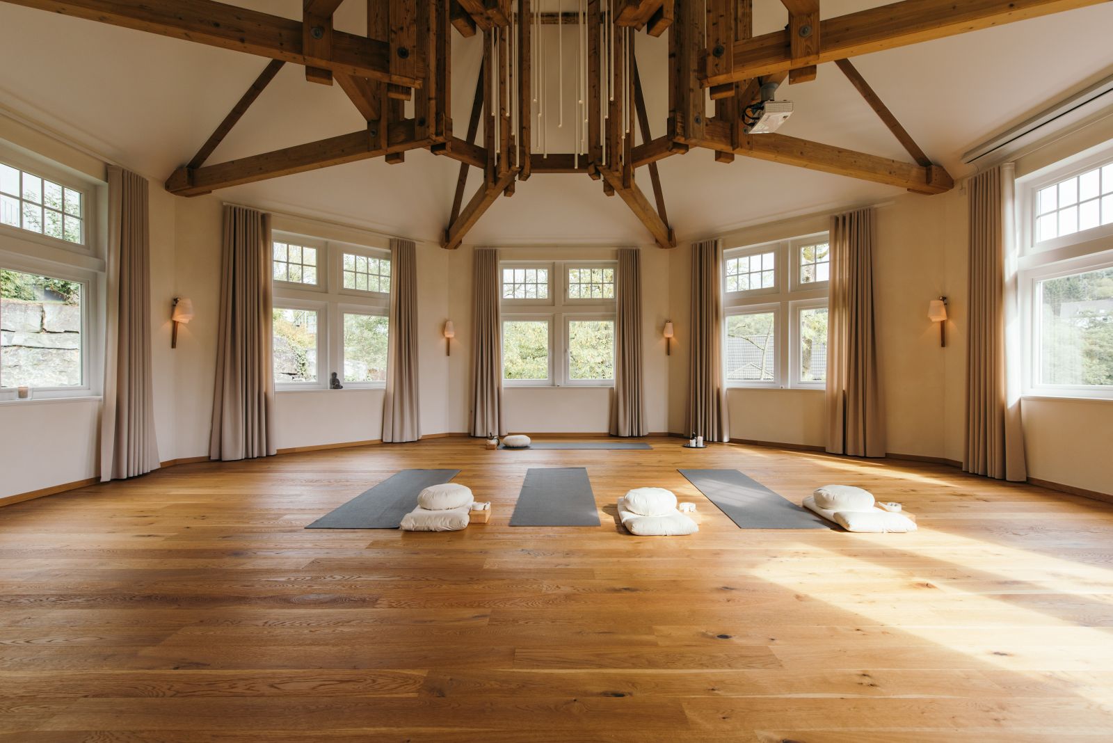 Yoga room with centres and cushions