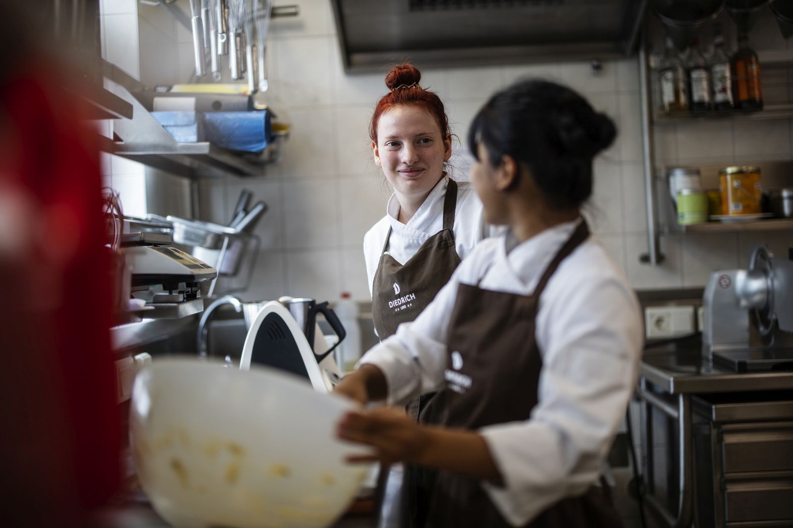 Two cooks in conversation