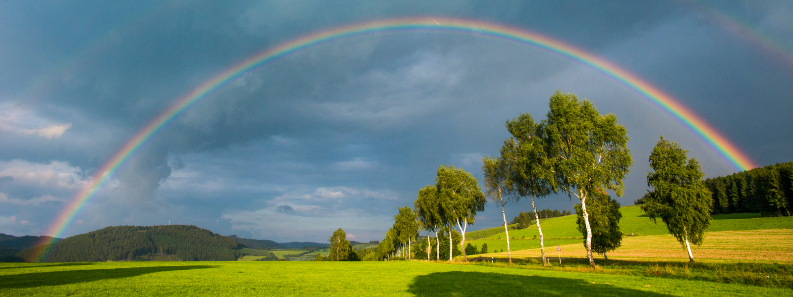 Rainbow with a view of the Sauerland landscape