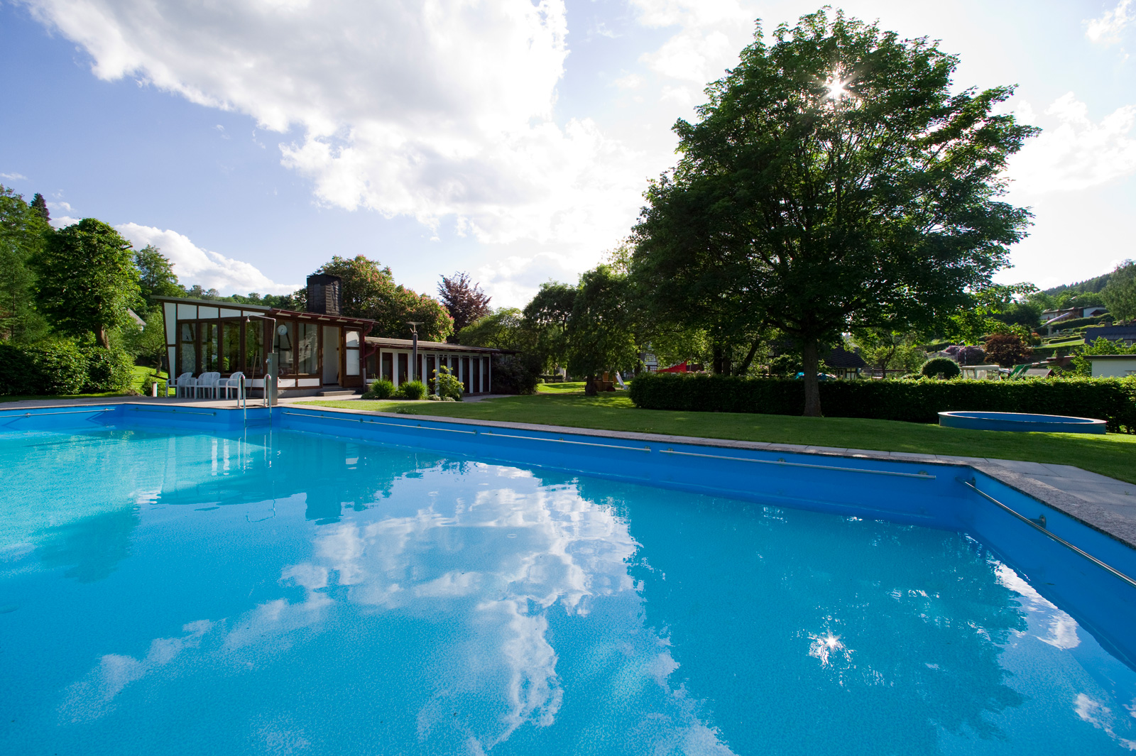 Outdoor pool in the large garden